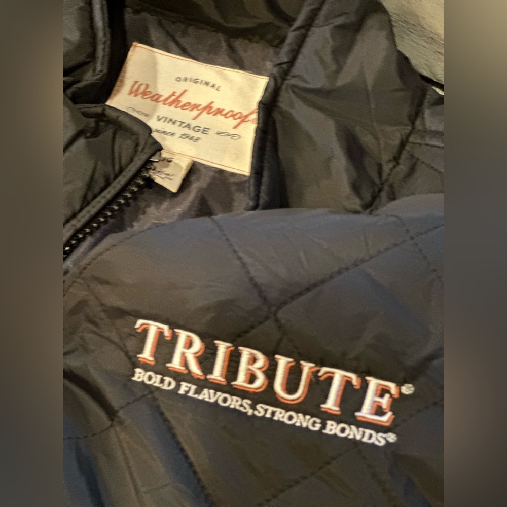 Weatherproof Vintage Poly/Nylon women’s vest with Tribute Wine logo emb L chest.